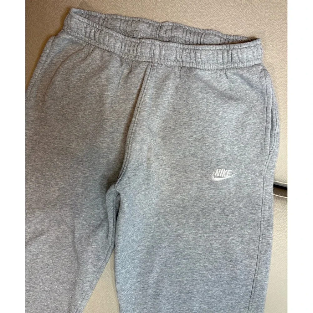 Men's large Nike Athletic Sweatpants Gray with white Nike swoosh.